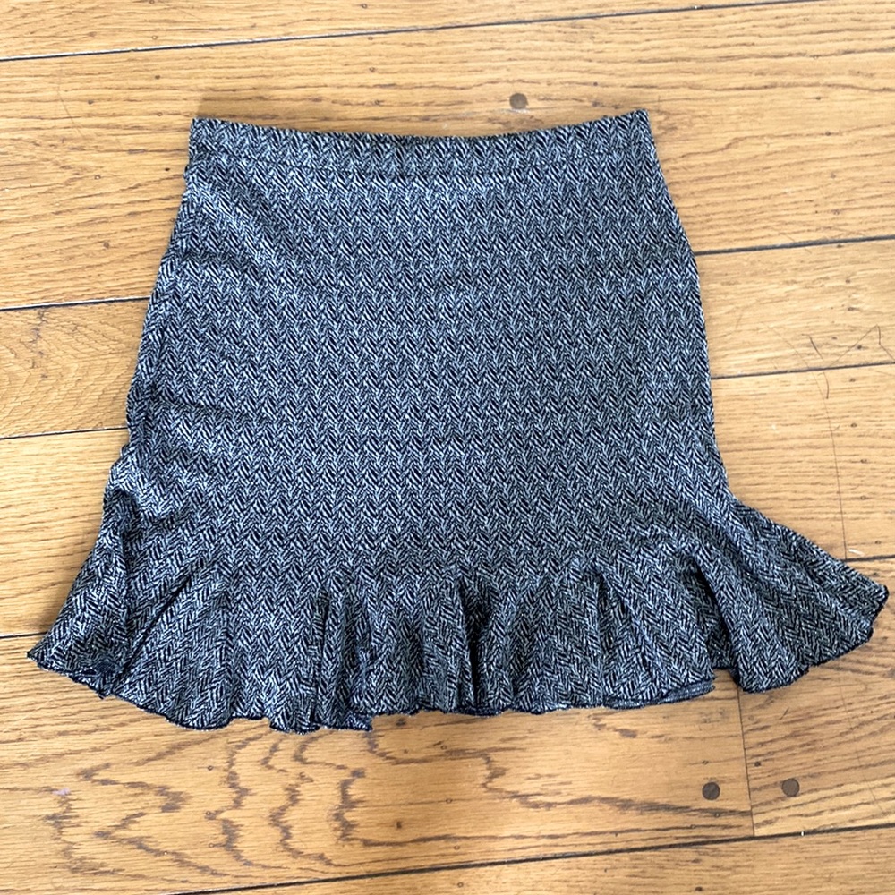 Houndstooth skirt, slimming with bottom fringe